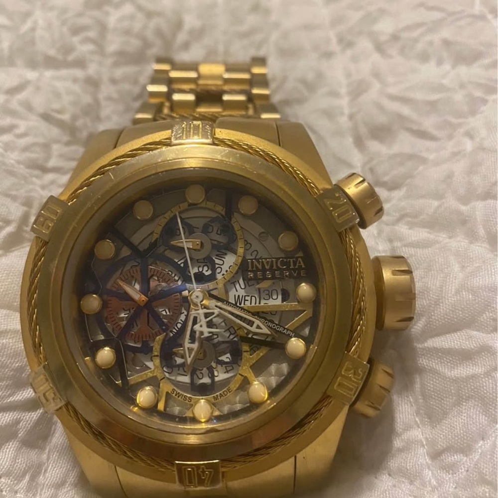 Invicta gold bolt zeus watch is missingg 1 pin on the belt